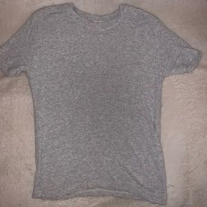 Gray and white checkered t shirt.